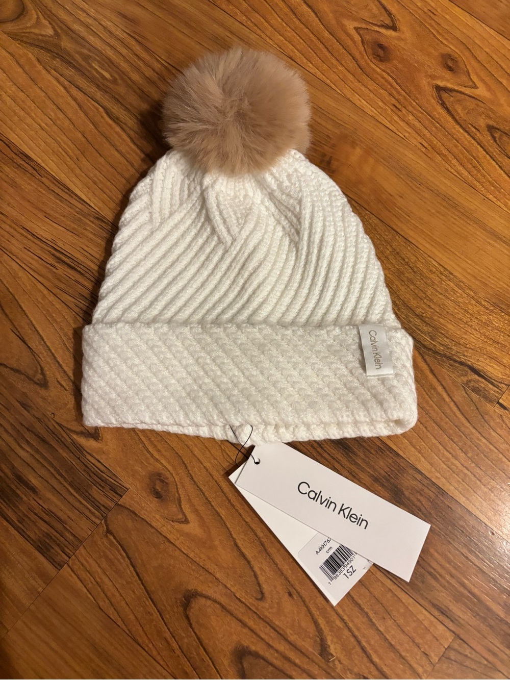 Calvin Klein Cream-White Cable Knit Beanie with Tan Pom